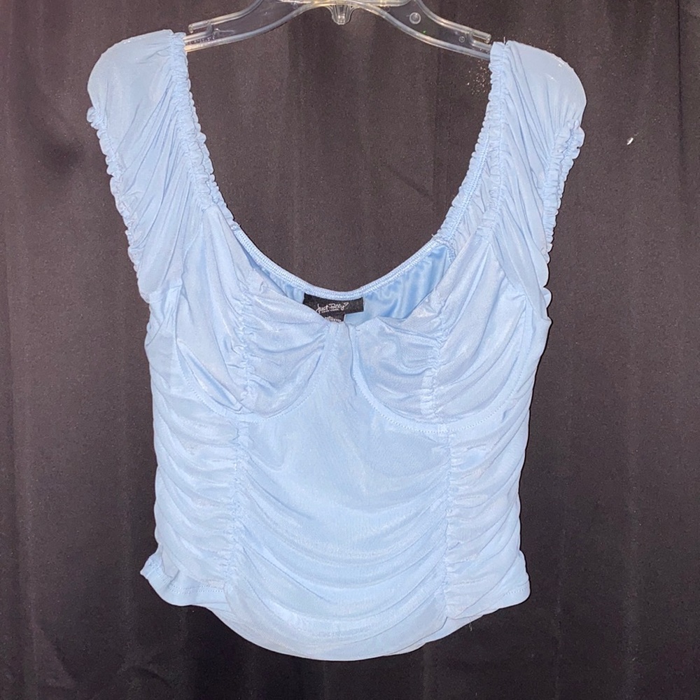 Never worn. To small for Breast.